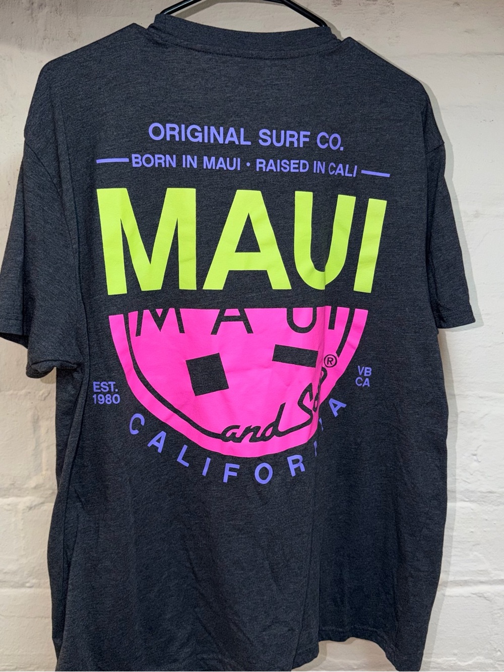 Maui and Sons Charcoal Tee with Neon Pink & Yellow Logo - Picture 3 of 3